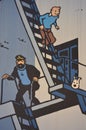 Closeup over a Tintin Comic Mural, Tintin, the boy reporter, his beloved fox terrier Snowy, and Captain Haddock, Rue de lÃ¢â¬â¢Etuve